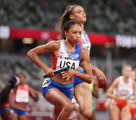  ?? Patrick Smith/Getty Images ?? Allyson Felix sets off on her historic leg of the women’s 4x400 relay Saturday in Tokyo.