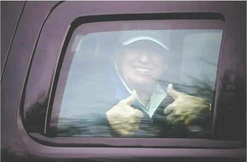  ?? Hannah Mckay / REUTERS ?? U. S. President Donald Trump gestures as his motorcade leaves Trump National Golf Club in Sterling, Va.,
on Sunday. Another of Trump’s election court challenges failed late Saturday.