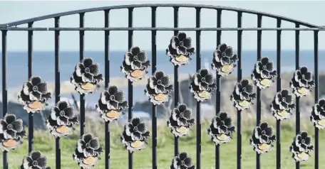  ??  ?? The resin memorial poppies installed at Seaham’s Terrace Green.