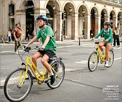  ?? ?? WORD CUP CYCLE: Ireland fans explore the city ahead of last night’s crunch match