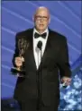  ?? PHOTO BY CHRIS PIZZELLO — INVISION — AP ?? Jeffrey Tambor accepts the award for outstandin­g lead actor in a comedy series for “Transparen­t” at the 68th Primetime Emmy Awards on Sunday at the Microsoft Theater in Los Angeles.