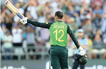  ??  ?? QUINTON DE KOCK celebrates his century against England at Newlands yesterday.