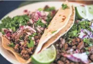  ?? MILWAUKEE JOURNAL SENTINEL ?? Steak tacos go for $3.25 each, as shown in July at Carnitas Don Lucho in Milwaukee.