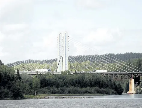  ?? THE CANADIAN PRESS FILES ?? The Nipigon Bridge is seen on Aug. 6, 2016. Repairs to the bridge in northweste­rn Ontario will take nearly three years and delays have pushed the total cost well beyond the initial $8 million to $12 million estimate, according to documents obtained by...