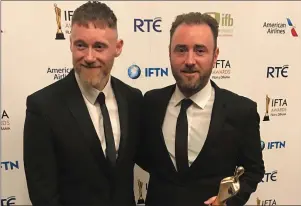  ??  ?? Colin and Darren Thornton with their award for Best Film at the Irish Film and Television Awards.