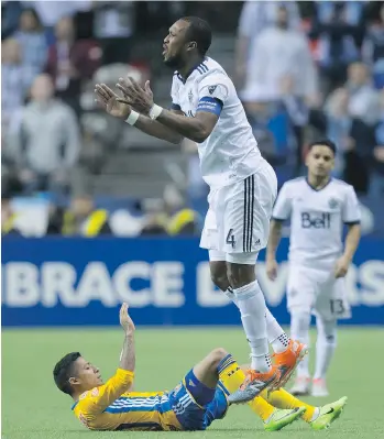  ?? THE CANADIAN PRESS FILES ?? Kendall Waston, reacting to a call April 5 in a CONCACAF Champions League semifinal, has been playing “brilliantl­y” for the Whitecaps after piling up numerous cards and suspension­s last season.