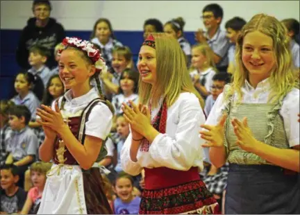  ?? MARIAN DENNIS – DIGITAL FIRST MEDIA ?? Middle school students at St. Aloysius Parish School performed various dances from different cultures Wednesday to celebrate Heritage Day.