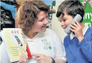  ?? Mike Carter ?? King’s pupil Hugo Vital with Kath Rose from Mini First Aid