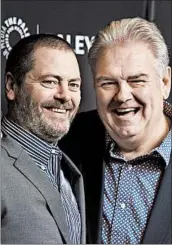  ?? CHRIS PIZZELLO/INVISION 2019 ?? Nick Offerman, left, and Jim O’Heir are among the cast members reuniting for “A Parks and Recreation Special.”