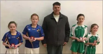  ??  ?? The Under-10 doubles finalists from Taghmon and Templeudig­an with Ricky Barron (Vice-Chairman).