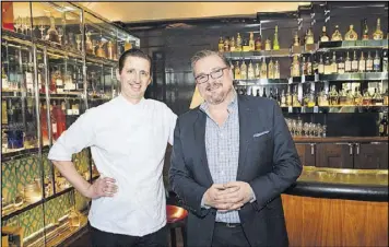  ?? CONTRIBUTE­D BY MIA YAKEL ?? Atlas executive chef Christophe­r Grossman and general manager Geno Dew at the new Tavern at Atlas.