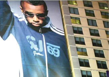  ?? (*highlimitz­z/Flickr) ?? HIP-HOP impresario Sean ‘Diddy’ Combs, seen here on a New York City billboard, promoted Louis Farakkhan’s lecture in which he called the Jewish people ‘Satan.’