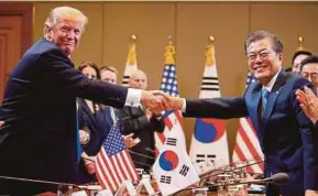  ?? REUTERS PIC ?? United States President Donald Trump and South Korean President Moon Jae-in at the Blue House in Seoul yesterday.