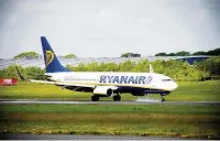  ??  ?? Delay Passengers sat on the plane as June Brown was removed after causing turbulence of her own