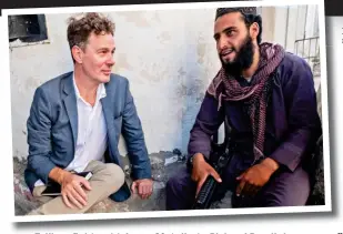  ?? ?? Taliban fighter: Maiwan, 20, talks to Richard Pendlebury