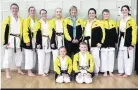  ??  ?? Ashington Karate Club’s competitor­s at the KUGB National Championsh­ips with senior club instructor Sensei Jill Kelly