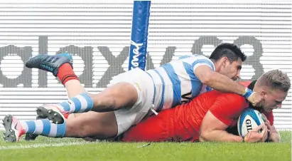  ?? Picture: AFP ?? MILESTONE. Springbok flanker Jean-Luc du Preez dives over to score his first Test try in the Rugby Championsh­ip match against Argentina in Salta on Saturday night.