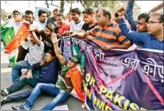  ?? IANS ?? Bhartiya Janta Yuva Morcha (BJYM) activists stage a demonstrat­ion outside Eden Gardens.