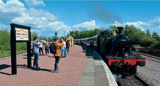  ??  ?? Dean Forest Railway visitors stretch their legs and admire GWR prairie No. 5541 and its gleaming rake of coaches at Lydney Junction on May 19. The railway started its 2021 season on April 17.