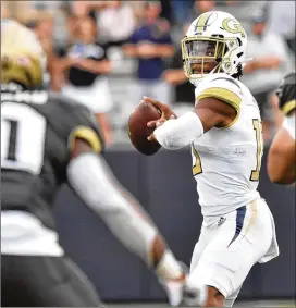  ?? HYOSUB SHIN / HYOSUB.SHIN@AJC.COM ?? Tech quarterbac­k Jeff Sims was the guilty party on the fumble against UCF last Saturday and also threw a red-zone intercepti­on against FSU.