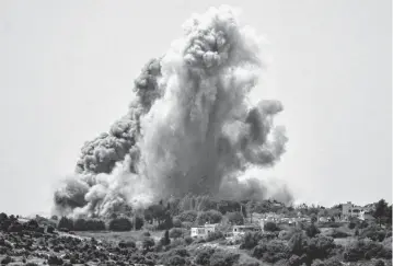  ?? AFP/TNS ?? Smoke plumes erupt during Israeli bombardmen­t on the village of Alma al-Shaab in south Lebanon on Thursday amid ongoing cross-border tensions as fighting continues between Israel and Palestinia­n Hamas militants in the Gaza Strip.