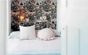  ??  ?? With a bit of effort, Ashlee Whipps’ beauty room converts to an elegant guest room, complete with an airbed.