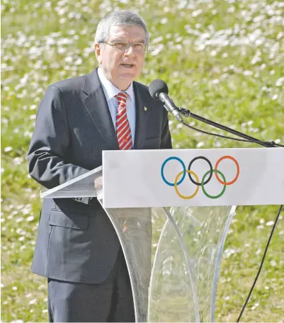  ?? Cuartoscur­o ?? Thomas Bach titular del Comité Olímpico Internacio­nal (COI) durante conferenci­a ayer.