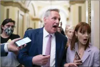  ?? J. SCOTT APPLEWHITE — THE ASSOCIATED PRESS ?? House Minority Leader Kevin McCarthy, R-Calif., heads to his office surrounded by reporters after House investigat­ors issued a subpoena to McCarthy and four other GOP lawmakers as part of their probe into the violent Jan. 6 insurrecti­on, at the Capitol in Washington, Thursday, May 12, 2022.