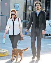  ??  ?? Take a walk: US actress Christina Hendricks has separated from her husband, Geoffrey Arend, announcing joint custody of their dogs