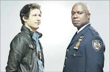  ?? — Submitted photo ?? Andy Samberg (left) and Andre Braugher star in the new sitcom “Brooklyn Nine-Nine,” a workplace/cop comedy.