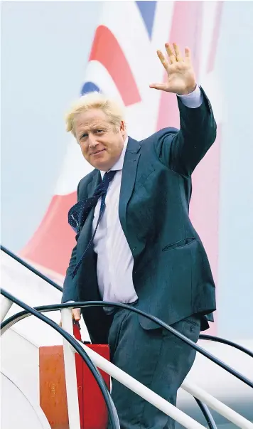  ??  ?? Boris Johnson boards RAF Voyager at Stansted Airport en route to talks with President Joe Biden in Washington. The Prime Minister was said by a senior source to have prepared an ‘impassione­d’ case for double-jabbed Britons to be allowed to travel to the US