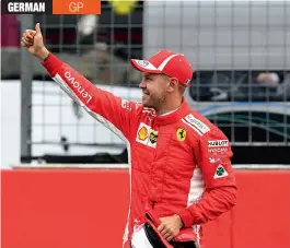  ?? — AFP ?? Ferrari’s Sebastian Vettel celebrates after grabbing the pole for the German GP in Hockenheim on Saturday.