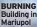  ?? ?? BURNING Building in Mariupol