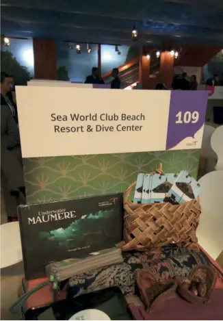 ??  ?? Buku Underwater Maumere di booth Sea World Club Beach Resort & Dive Centre