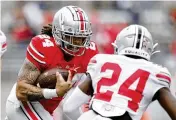  ?? ASSOCIATED PRESS ?? Running back Marcus Crowley, a four-star prospect who showed promise, won’t play again, Ohio State coach Ryan Day announced Friday.