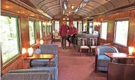  ??  ?? Above: Di and Simon Parums in one of the carriages used in the movie Murder On The Orient Express that has been relocated to Bassenthwa­ite Lake station.
PETER ROOKE