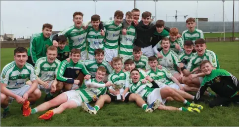  ??  ?? O Raghallaig­h’s celebrate their Argus U-16 Division 1A success following victory over Newtown Blues. Pictures: Kieran Carr.