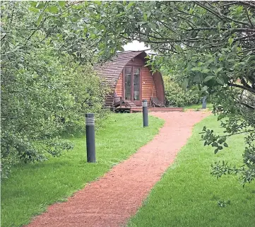  ??  ?? SHELTER: Andrew Hall used trees to create a scenic area for his glamping pods.