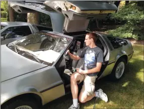  ?? KIMBERLY FORNEK/CHICAGO TRIBUNE ?? Marty Lick of Lisle, Ill., said growing up in the 1980s with the name Marty, like the Michael J. Fox character in the “Back to the Future” movies, it seems meant to be that he would own his own DeLorean one day.