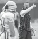  ?? DOUG ENGLE/GAINESVILL­E SUN ?? Florida head coach Billy Napier directs his players during spring football practice on Tuesday in Gainesvill­e.