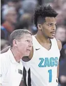  ?? YOUNG KWAK/AP ?? Coach Mark Few, guard Admon Gilder and Gonzaga have five straight wins.