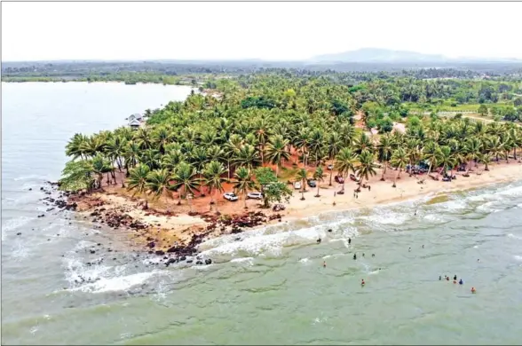  ?? HONG MENEA ?? Nesat beach – a name inspired by a nearby fishing village – has seen more and more tourists flock to its shores after its popularity surged through pictures of its glorious scenery emerging on social media.