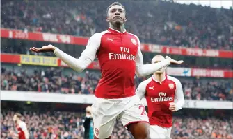  ??  ?? Arsenal’s Danny Welbeck celebrates after sealing the three points for the Gunners with his seventh goal of the season