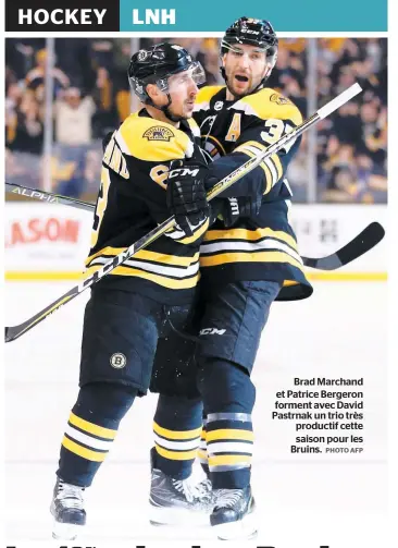  ?? PHOTO AFP ?? Brad Marchand et Patrice Bergeron forment avec David Pastrnak un trio très productif cette saison pour les Bruins.