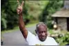  ?? MATT ROURKE — THE ASSOCIATED PRESS ?? Bill Cosby gestures outside his home in Elkins Park, Pa., Wednesday, June 30, 2021, after being released from prison.