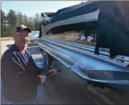  ?? PAUL POST — PPOST@DIGITALFIR­STMEDIA.COM ?? Point Breeze Marina employee Ken Welch washes a boat in preparatio­n for this weekend’s Great Upstate New York Boat Show in Queensbury.