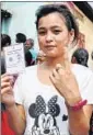  ??  ?? A girl shows her ink-marked finger after casting vote in Ri-Bhoi, Meghalaya, on Wednesday. PTI PHOTO
