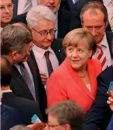  ?? REUTERS ?? La cancellier­a tedesca Angela Merkel si prepara a votare al Bundestag l’ok al piano di salvataggi­o della Grecia