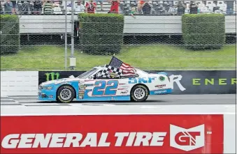  ?? [MATT SLOCUM/THE ASSOCIATED PRESS] ?? Brad Keselowski celebrates after winning the NASCAR Xfinity Series race Saturday in Long Pond, Pa.