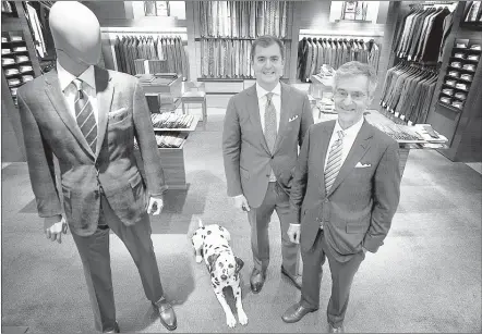  ?? PHOTOS BY MIKE BROWN/THE COMMERCIAL APPEAL ?? “We’ve been looking at Nashville for nearly 20 years,” said Bill Levy (right) with son Will and Dalmatian Jake. Will is the sixth generation of the family that has operated Oak Hall clothing store in Memphis since 1859. His cousin Chris Levy will...